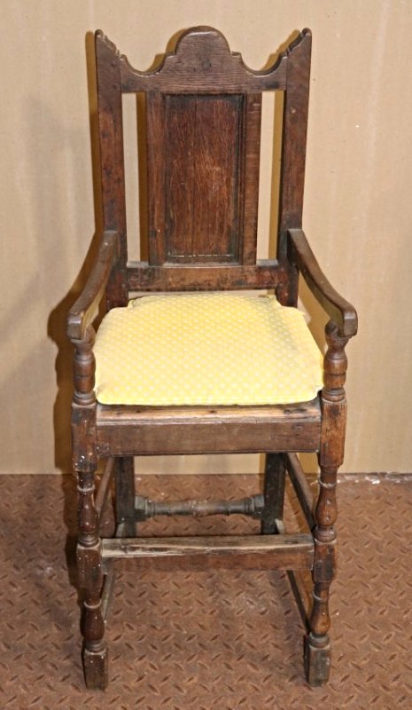 High Chair James I Oak circa 1620: A beautifully preserved piece. Appraisal is included from 1957 by a British antiquities dealer and member of of the British Antique Dealers association guaranteed as a genuine antique.