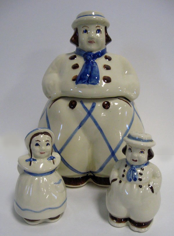 Dutch children cookie jar and matching salt and pepp: Dutch children cookie jar and matching salt and pepper shakers, marked USA. Good condition with small flaws in the making. 10 3/4''h., 5 3/8''h., 5''h.