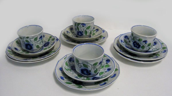 Fourteen piece Gaudy Ironstone set in rare: Fourteen piece Gaudy Ironstone luncheon set in rare blue and green. Six luncheon plates and four handleless cups and saucers. Hairline in one plate and one cup. One saucer is crazed and stained. One p