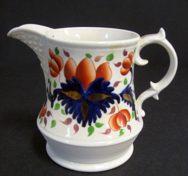 Gaudy Welsh pitcher with cream clot gate and pinea: Gaudy Welsh pitcher with cream clot gate and pineapple spout, beaded trim, gold touches. r spout, normal wear, good condition, minor discoloration near spout. 5 1/2''h.
