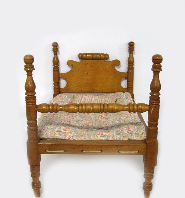 Pease/Brown doll bed. James C. Brown doll bed mad: Pease/Brown doll bed. James C. Brown doll bed made for his great niece. Signed J.B. 1951. Maple bed with tiger maple rails. Good condition. 18''h x 22 1/4''l x 15 1/2''w. $250-350
