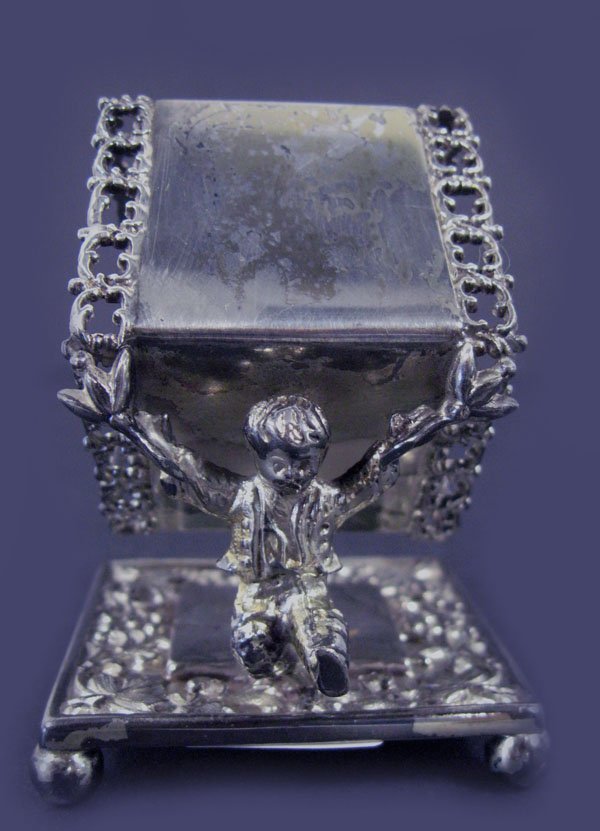 Figural napkin ring by Meriden. Skipping boy supp: Figural napkin ring by Meriden. Skipping boy supports ring. Good condition. Appropriate age wear. $50-100