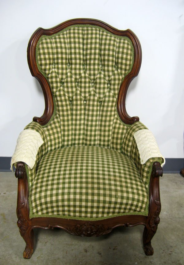 American Victorian lady's slipper chair. Upholster: American Victorian lady's slipper chair. Upholstered back, seat, and arms. Mahogany. Appropriate age wear. $80-120