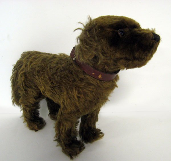 Dog. 12h'' x 14''l, antique dark brown mohair dog, ca 1: Dog. 12h'' x 14''l, antique dark brown mohair dog, ca 1930-40. German dark brown mohair dog unjointed with collar. Original glass eyes and nose, Unable to feel growler, excelsior stuffed. No ID, possi