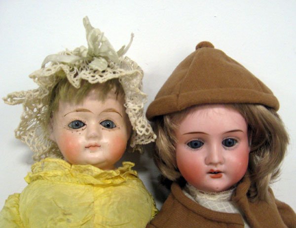 Two German dolls, 15'' Recknagel bisque and a papier ma: Two German dolls, 15'' Recknagel bisque and a papier mache. German bisque head no damage, open/close eyes, open mouth with teeth. Replaced new jointed body. Marked 21 / Germany / RN. Papier mache shou