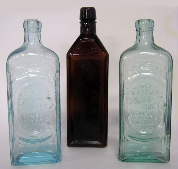 Three bottles. Doyles Hop Bitters, Dr. Kilmetz Swamp Ro: Three bottles. Doyles Hop Bitters, Dr. Kilmetz Swamp Root Cure, and Dr. Kilmetz Swamp Root Remedy. $60-80