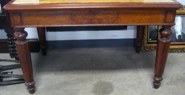 Walnut partners desk with two hand dovetailed drawers t: Walnut partners desk with two hand dovetailed drawers that pull out from sides. Original felt/leather missing. Appropriate age wear. 30''h x 48''l x 32 1/2''w. $150-250