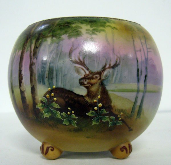 Nippon footed rose bowl with enameling with a forest sc: Nippon footed rose bowl with enameling with a forest scene with deer. signed $ 1/2''h. Appropriate age wear. $100-150