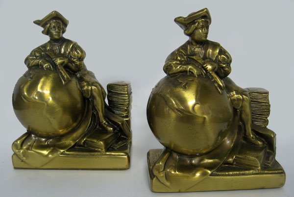 Two sets of bookends. Armored bronze ''Book Worm'' book: Two sets of bookends. Armored bronze ''Book Worm'' bookends. Seal on bottom. Signed F.G. Plant. Ca 1920. Split in one bookend. Christopher Columbus bookends, metal. Ca 1940. Patina over metal. Appropr