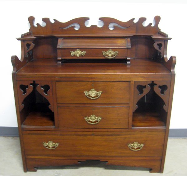 Mahogany server with fancy cut-outs, 4 drawers, and orn: Mahogany server with fancy cut-outs, 4 drawers, and ornate brasses. English. Early 20th century. Appropriate age wear. 44 1/2''h x 42''w x 19''d. $180-280