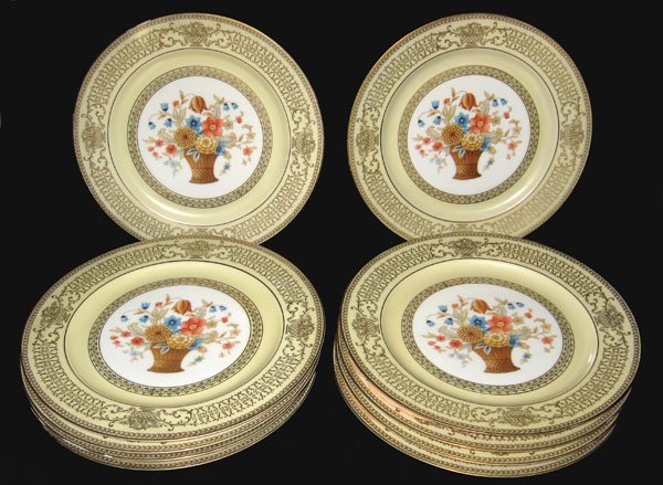 Ten Bavarian plates with basket of flowers motif and il: Ten Bavarian plates with basket of flowers motif and gilt trim. Note edge wear to gilt. Appropriate age wear. 10 3/4" dia. $80-120