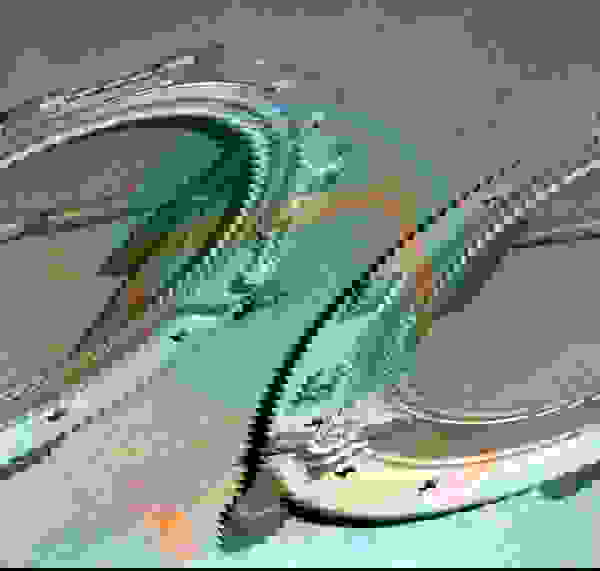 Ship's Porthole Made Into A Four Legged Table.