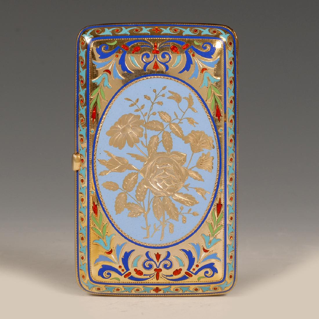 Russian Grachev silver and champleve enamel case: A Russian silver and champleve enamel cigarette case, Grachev Brothers, St. Petersburg, circa 1899-1904. Rounded retangular, each side centered with an engraved spray of flowers with a rose and daisie