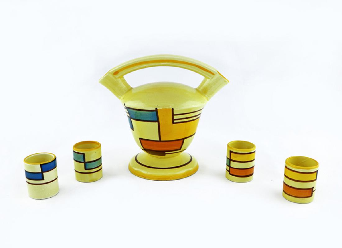 Eva Zeisel, a Schramberg Liqueur Set, ca1929-35: Eva Zeisel, a Liqueur Set comprising a Brandy Decanter (model 3208) and four Liqueur Beakers (model 3367), Schramberger Majolika-Fabrik, Schramberg, Germany, circa 1929-35. Décor: 3526 (later nicknam