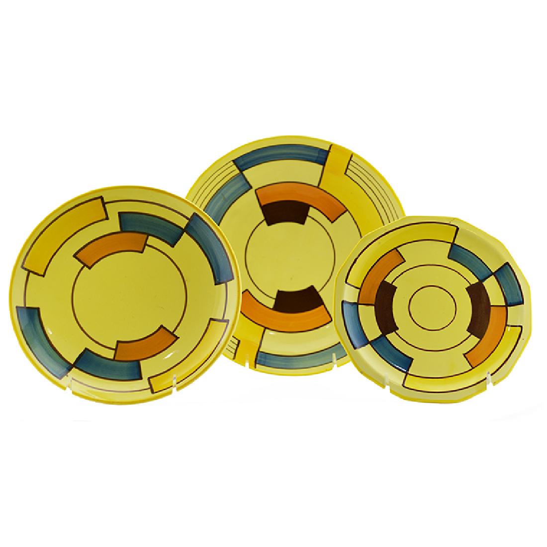 Eva Zeisel, a Schramberg bowl and fruit plates: Eva Zeisel, a Bowl on square foot (model 3352), a Fruit Plate (model 3435), and a 12-side Fruit Plate (model 3430), Schramberger Majolika-Fabrik, Schramberg, Germany, circa 1929-35. Décor: 3526 (late