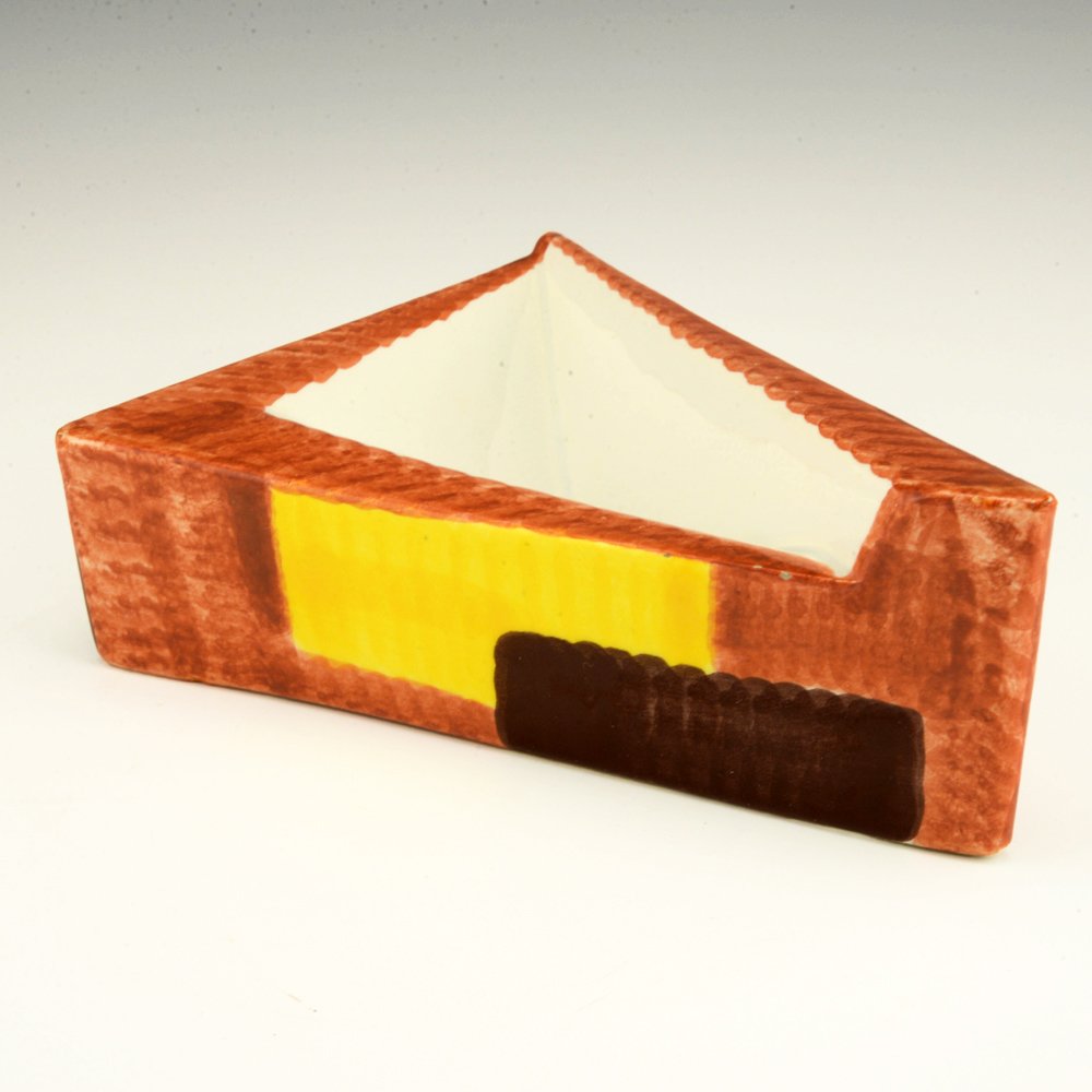 Eva Zeisel, a Schramberg Triangular Ashtray (3261): Eva Zeisel, Triangular Ashtray (model 3261), Schramberger Majolika-Fabrik, Schramberg, Germany, circa 1929-35. Décor: Gobelin 13. Height: 2 1/4 in. (6 cm), width 4 3/4 in. (12 cm), depth 7 in. (17.5