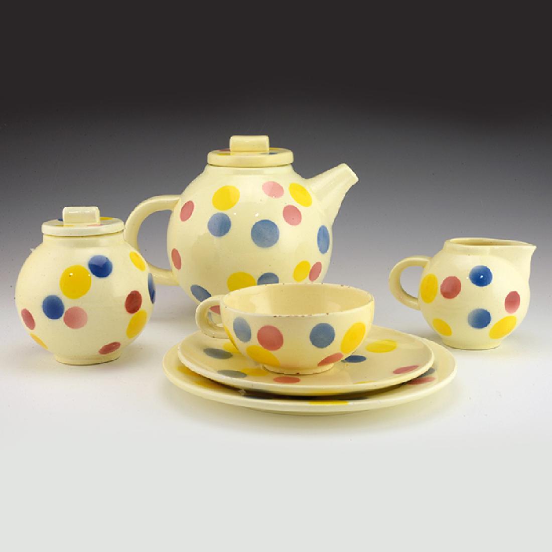 Eva Zeisel, a Schramberg Tea Set, ca1929-35: Eva Zeisel, a part Tea Service comprising Teapot with lid (model 3356), Sugar with lid (model 3357), Creamer (model 3358), Cup and Saucer (model 3389), Dessert Plate (model 3003), Schramberger Majolik