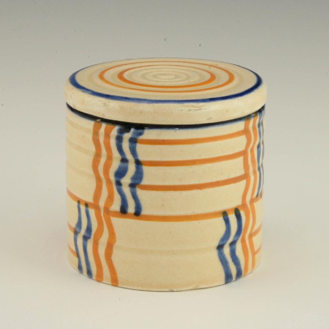 Eva Zeisel, a Schramberg Box, ca1929-35: Eva Zeisel, a small lidded Box (model 3399 or 3400?), Schramberger Majolika-Fabrik, Schramberg, Germany, circa 1929-35. Décor 211 Harp. Height: 2 1/4 in. (5.5 cm), dia.: 2 3/8 in. (6 cm). 1620-043. P