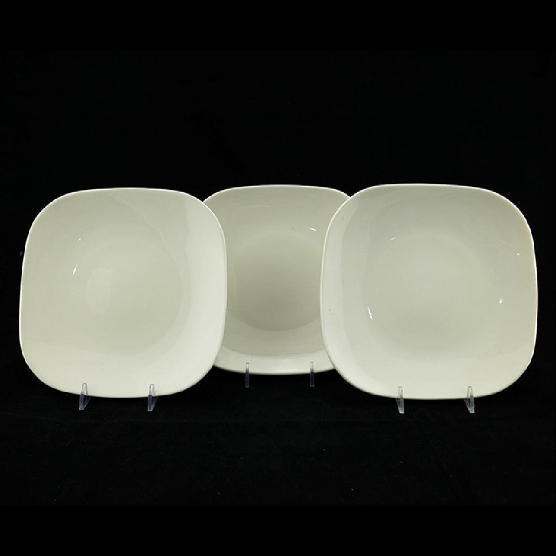 Eva Zeisel, 3 Museum Square Salad Plates: Eva Zeisel, three square Salad Plates, Museum Service, Castleton China, New Castle, PA, designed 1942-1943. All with black Castleton lyre marks. 8 1/4 x 8 1/4 in. (21 x 21 cm). 1620-139 Exhibited: San