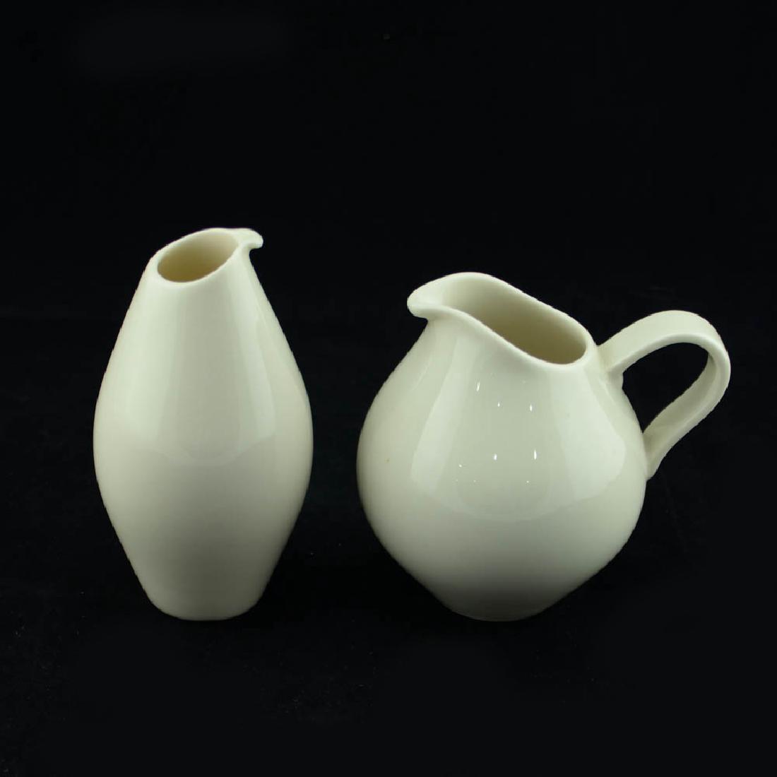 Eva Zeisel, 2 Museum Service Creamers: Eva Zeisel, Two Creamers, one designed without handle, Museum Service, Castleton China, New Castle, PA, designed 1942-1943. Unmarked. H. 5 1/2 in. (14 cm), dia. 2 3/4 in. (7 cm). 1620-150 Exhibited (C