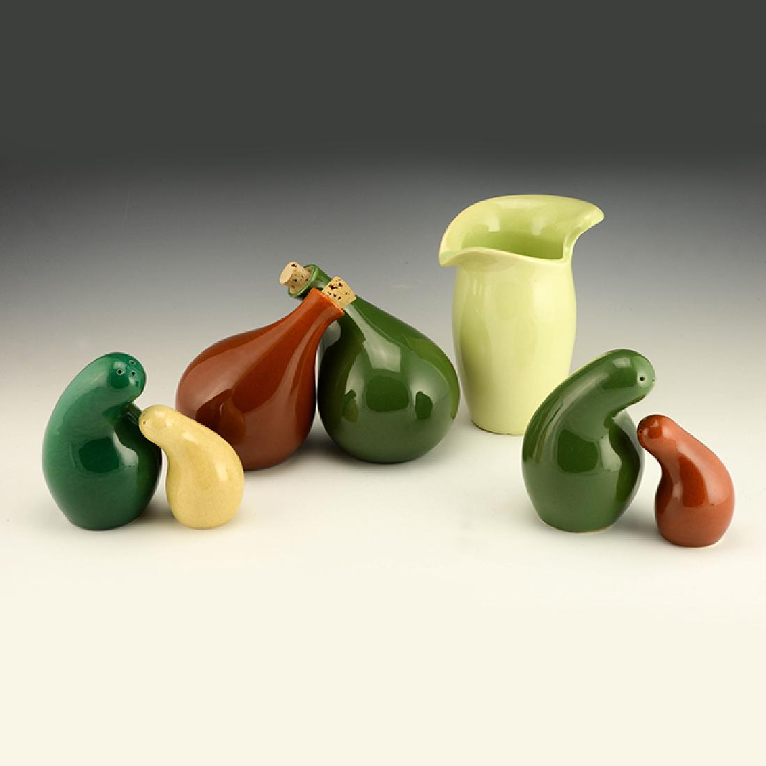 Eva Zeisel, Town & Country Serving Pieces: Eva Zeisel, a group of condiment and sauce serving pieces comprising a scarce pair of Vinegar and Oil Cruets with cork stoppers, two pairs of Salt and Pepper Shakers, and a Syrup Jug, Town and Country