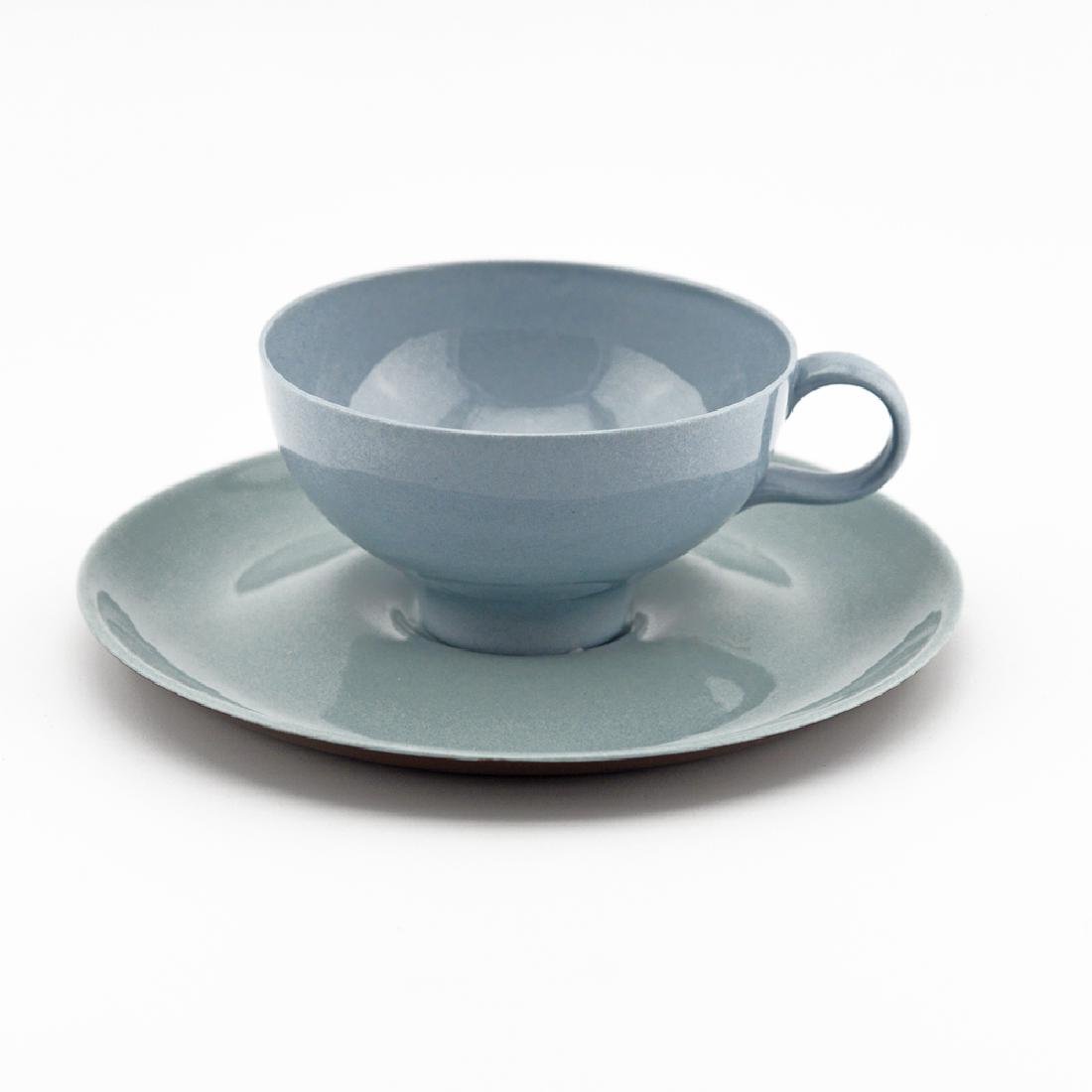 Eva Zeisel, Rare Riverside Cup & Saucer: Eva Zeisel, a rare Cup in Light and Saucer in Two-Tone Light Blue and Chocolate Brown Glaze, Riverside Ceramics, 1947. Porcelain. Height of teacup: 2 1/2 in. (6.3 cm), width over handle: 5 1/8 in. (13