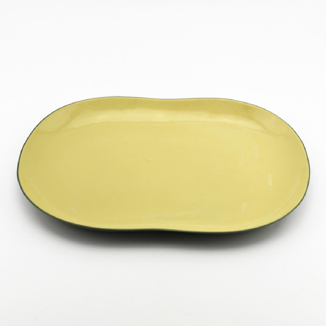 Eva Zeisel, Rare Riverside 2-Tone Oval Platter: Eva Zeisel, a rare Two-Tone Avocado Green and Yellow Oval Serving Platter, Riverside Ceramics, Riverside, California, 1947. Porcelain. Length 14 1/8 in. (35.8 cm), width 10 in. (25.5 cm). 1620-186 Exh