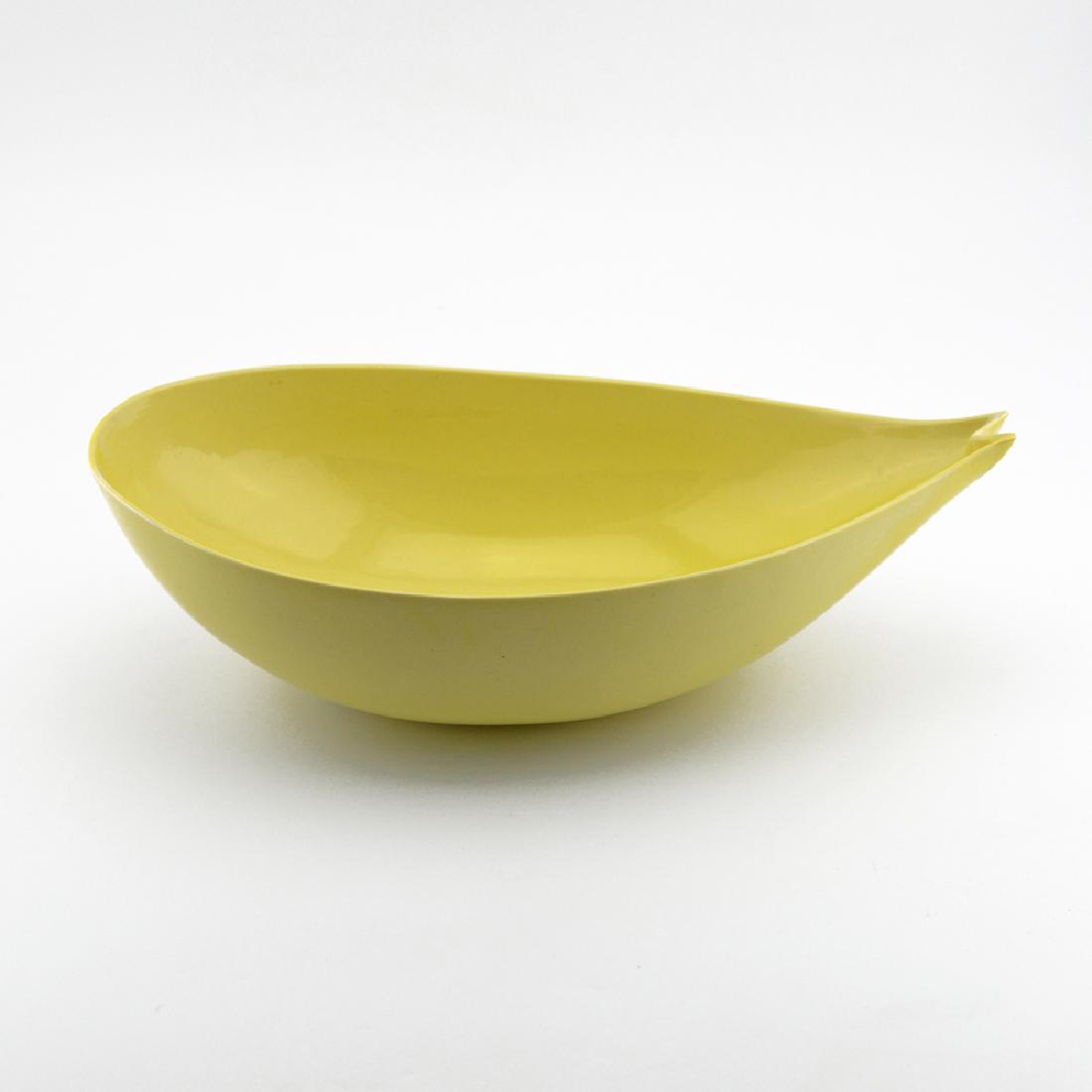 Eva Zeisel, Rare Riverside Rocking Fishtail Bowl: Eva Zeisel, an extremely rare large Light Yellow Rocking Fishtail Bowl, Riverside Ceramics, Riverside, California, 1947. Porcelain. Length: 14 1/2 in. (37 cm); height at nose 4 1/4 in. (11 cm). 1620-1