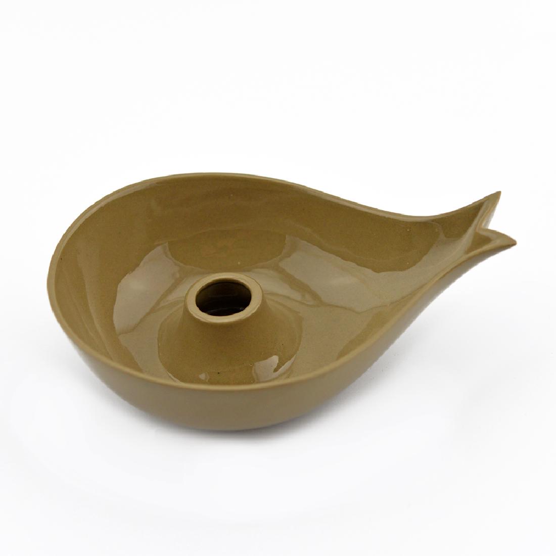 Eva Zeisel, Rare Riverside Fishtail Candlestick: Eva Zeisel, a rare Fishtail Candlestick in Deep Brown Glaze, Riverside Ceramics, Riverside, California, 1947. Porcelain. Length: 5 3/4 in. (14.5 cm); height at nose 2 in. (5 cm). 1620-190 Provenance: