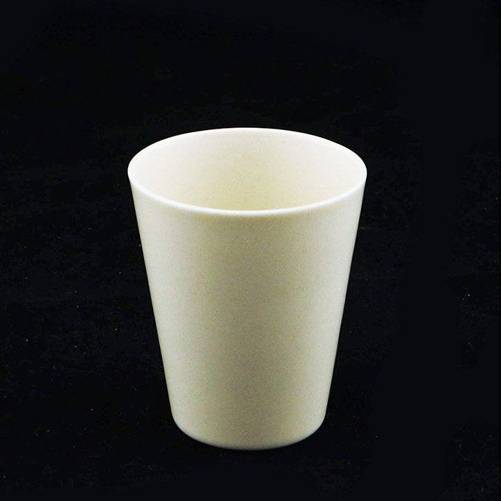 A Riverside Tumbler with test of the White Glaze: A very rare small tumbler with a test of the White Glaze for Eva Zeisel's Riverside line, unmarked, Riverside Ceramics, 1947. Porcelain. Height 2 7/8 in. (7.3 cm), dia. at top 2 3/8 in. (6 cm). 1620-4