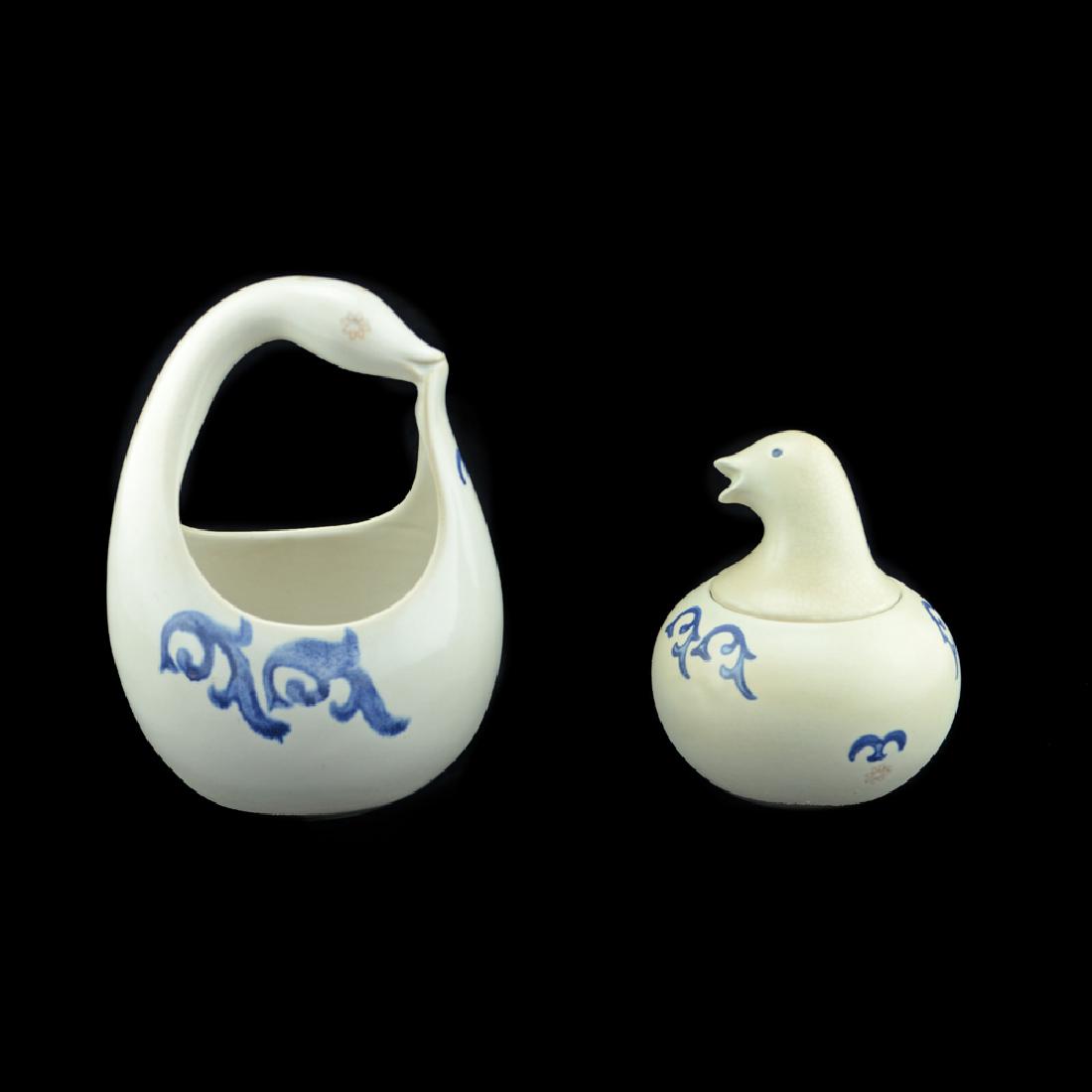 Eva Zeisel, 2 Monmouth Bird-Form Vessels: Eva Zeisel, a bird-form Basket or Sauce Boat, Pennsylvania Dutch decoration pattern, together with a bird-form lidded Sugar Bowl in Colonial decoration pattern, Eva Zeisel Fine Stoneware, Monmouth Pot
