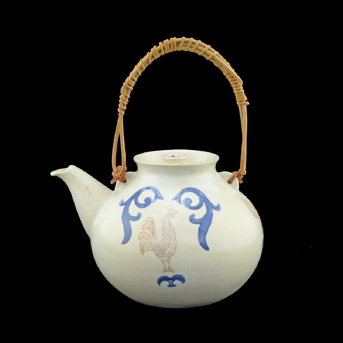 Eva Zeisel, Monmouth Stoneware Teapot: Eva Zeisel, a Teapot with lid, Pennsylvania Dutch decoration pattern, Eva Zeisel Fine Stoneware, Monmouth Pottery, Western Stoneware Company, Monmouth, Illinois, circa 1953-1954. With standard blue ba
