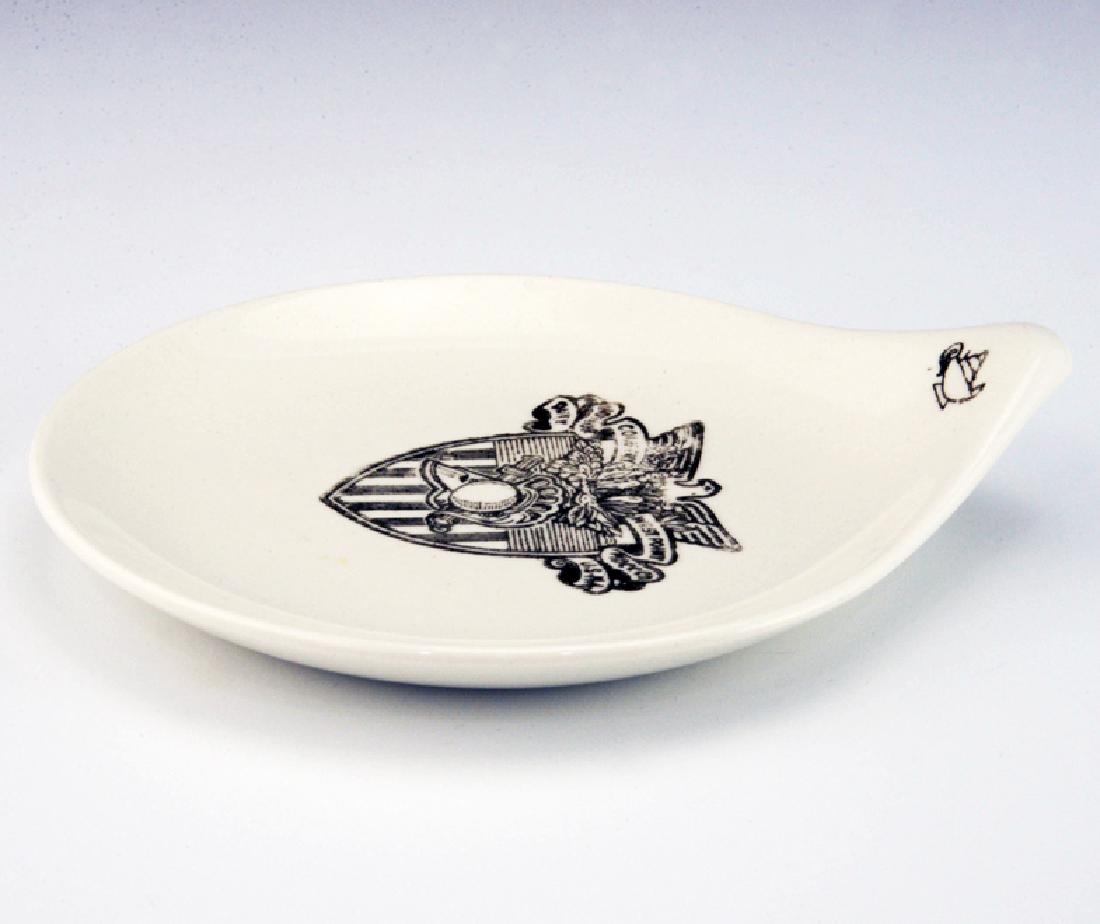 Very Rare Zeisel Hallcraft Century Ashtray: Eva Zeisel, a very rare Hallcraft Century Ashtray with the gilt crest of the US Military Academy West Point and the Lamp of Knowledge on the handle, the underside with the gilt mark of Norsid Ceramics