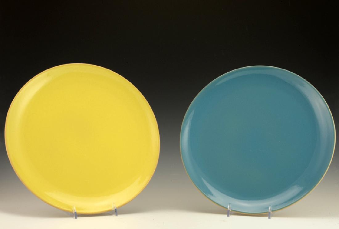 A Rare Pair of Zeisel Hollydale Plates: Eva Zeisel, a pair of rare Plates from Eva Zeisel Fine Stoneware/Hi-Fi Stoneware, Hollydale Pottery, South Gate, California, 1957. Both with standard stamp on underside. The front of the first glazed