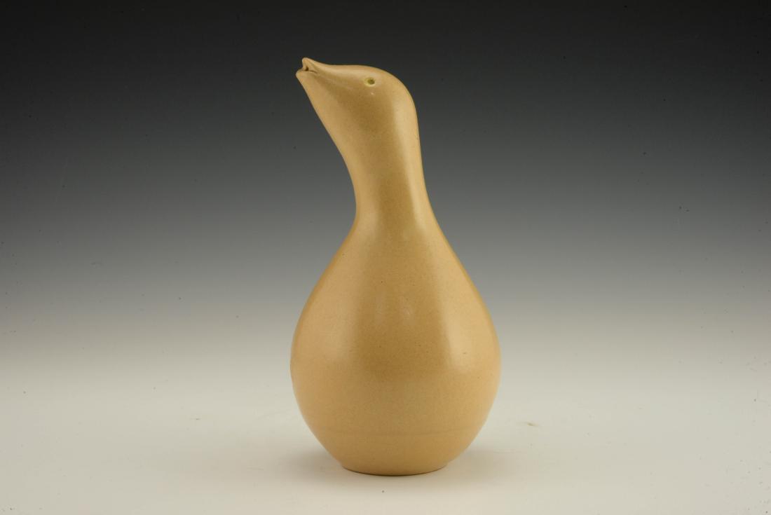 Rare Zeisel Hollydale Bird-Form Tall Shaker: Eva Zeisel, a rare bird-form tall Salt or Sugar Shaker, Eva Zeisel Fine Stoneware/Hi-Fi Stoneware, Hollydale Pottery, South Gate, California, 1957. Natural Terracotta with the eyes in Allegro Yellow.