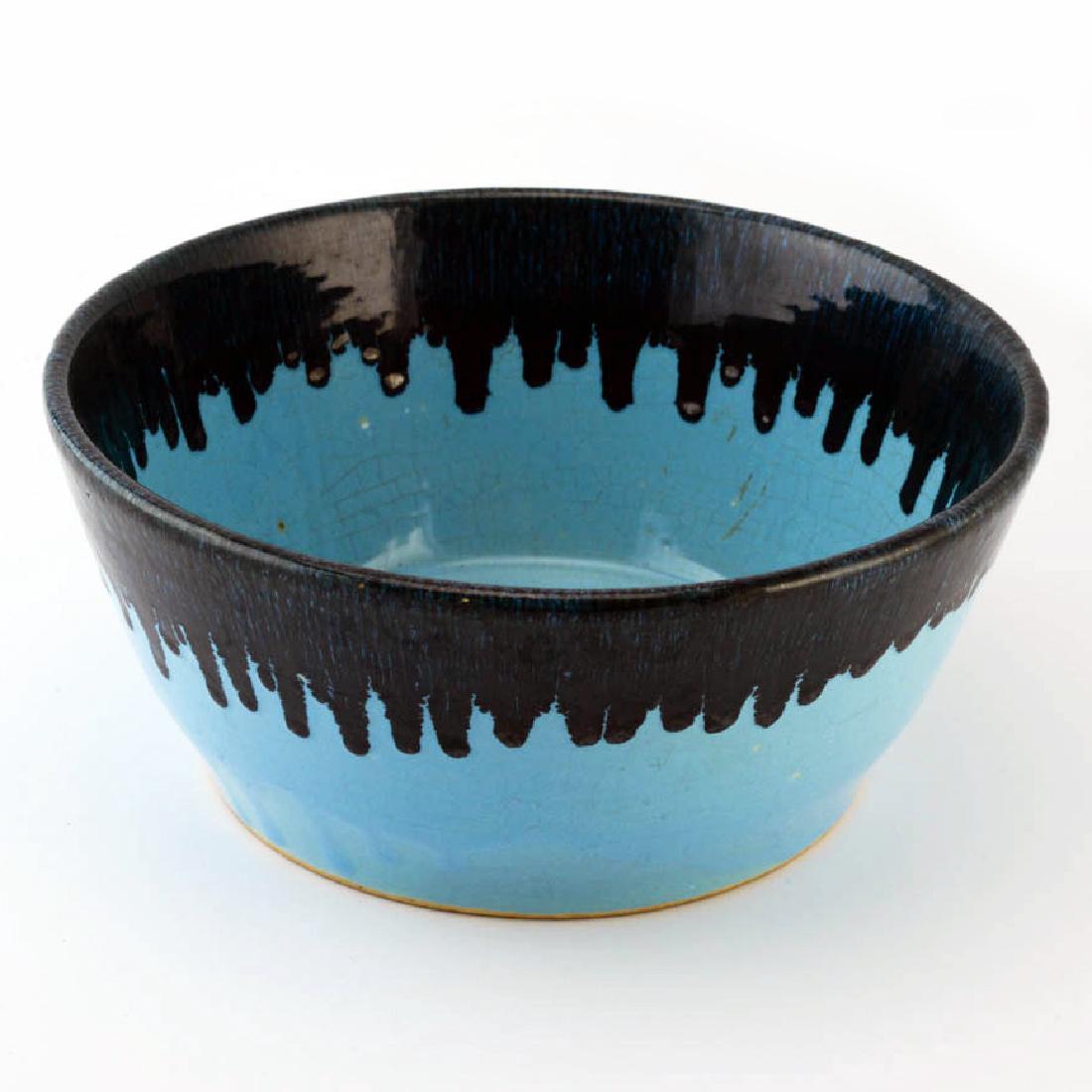 An Eva Zeisel Watt Pottery Cobalt Glaze Bowl: Eva Zeisel, a Serving Bowl from the South Mountain Stoneware line incorporated into the Orchard Ware line after 1959? Cobalt drip glaze, model number 110 in paste on underside as well as Watt USA and