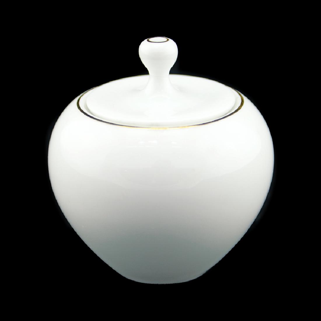 Zeisel Rosenthal Sugar Bowl: Eva Zeisel, a lidded Sugar Bowl from the Eva Line, decorated with a gilt band, Thomas, Rosenthal AG, designed 1957-1958. The underside with blue stamped mark Thomas Germany Design Eva Zeisel. Height w