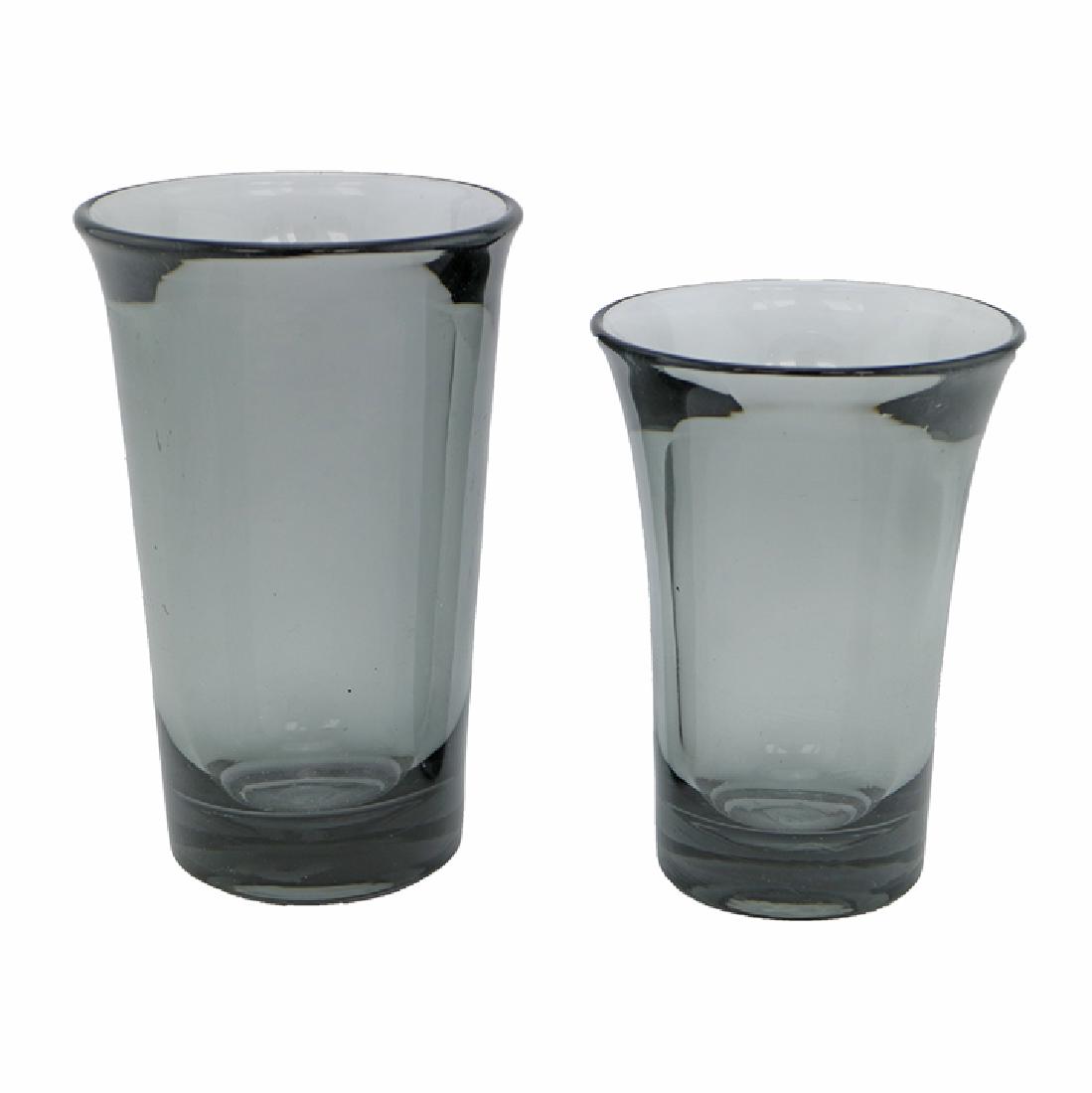 Zeisel Heisey Glass Town & Country Dawn Glasses: Eva Zeisel, a rare Iced Tea Glass and Tumbler, Dawn, Town & Country, A.H. Heisey & Co., Newark, Ohio, 1953-54. Mouth-blown glass. Iced Tea Glass 5 Â¼ x 3 3/8 in. (13.4 x 8.5 cm); Tumbler 4 1/4 x 4 1