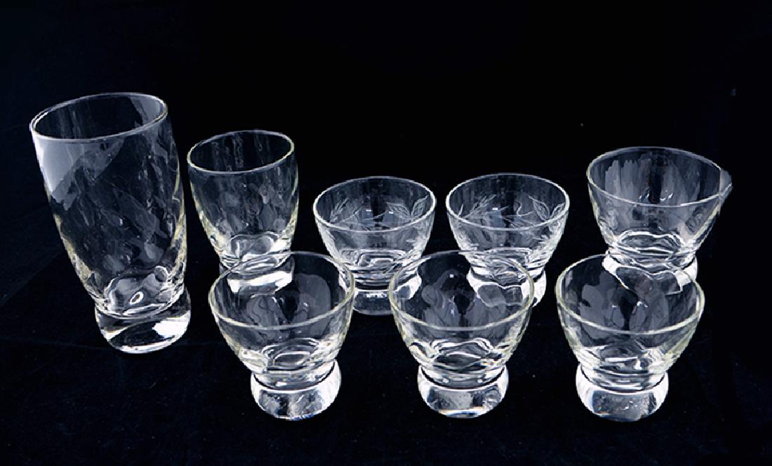 8 Zeisel Federal Glass Prestige Items: Eva Zeisel, a group of eight pieces from Federal Glass Company’s Prestige line, comprising an Iced Tea glass, a Juice Glass, an Old Fashioned glass, and three Cocktail Glasses in Swirl pattern, toge