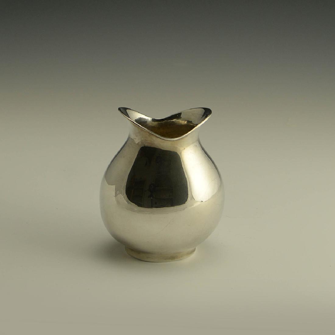 Zeisel Lim Ed Sterling Silver Bud Vase: Eva Zeisel, a Sterling Silver Bud Vase based on designs originally made for Hall China Company, the underside struck 925Sterling for fineness of silver, engraved E. Zeisel 5/100, made by an unidentifi