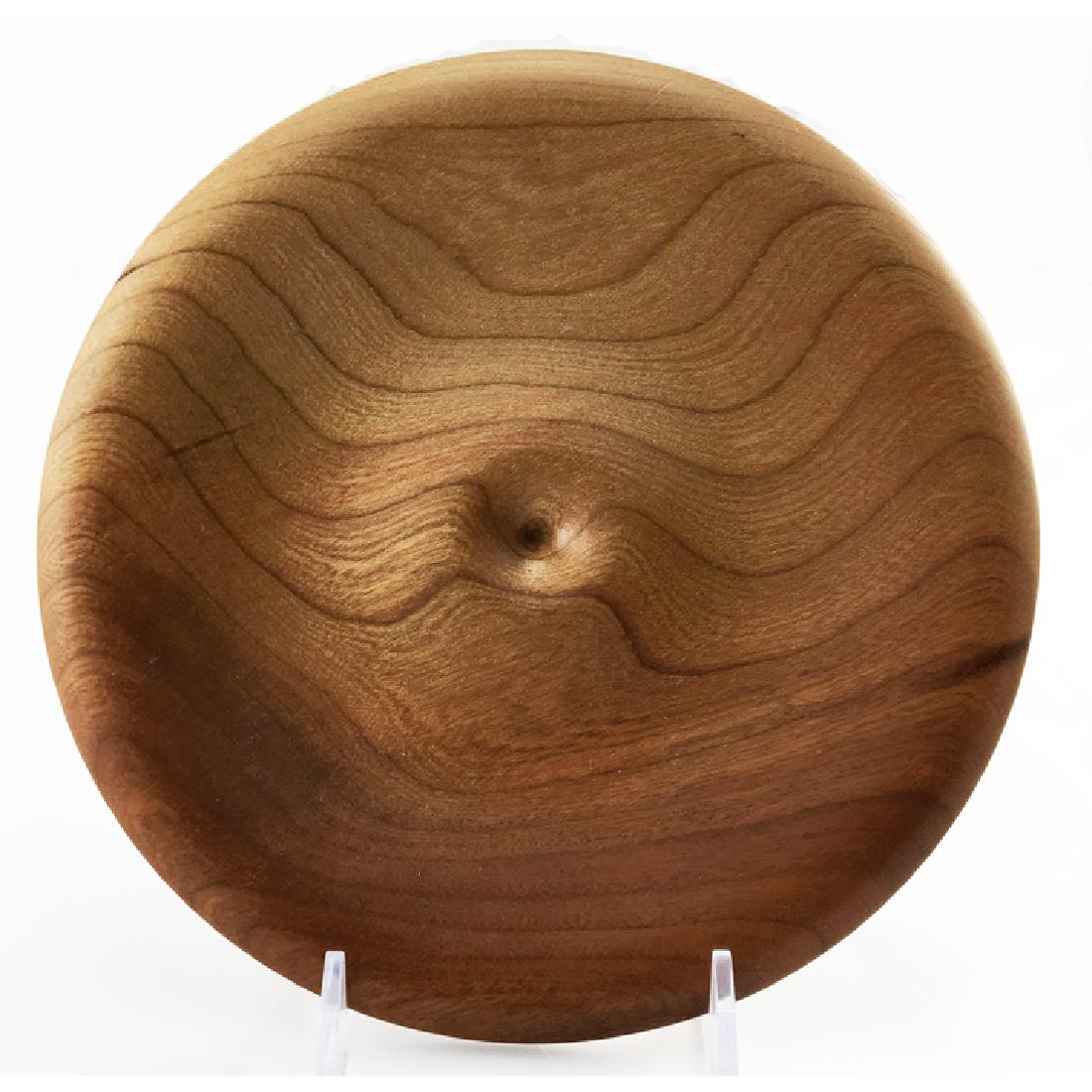 Zeisel Orange Chicken Turned Wood Plate: Eva Zeisel, a rare turned wood Plate, RB Universal Woodworks for Orange Chicken, 1997. The underside with burned marks RB Universal Woodworks and Eva Zeisel. Dia. 7 1/8 in. (18 cm); height: 3/4 in. (2