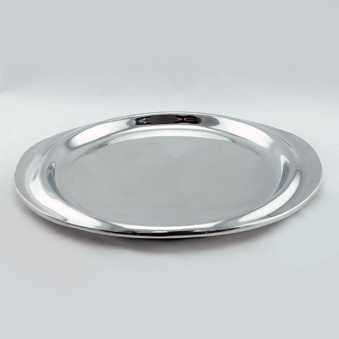 Zeisel Nambe Eden Circular Serving Tray: Eva Zeisel, Circular Eden Serving Tray, Nambé, design MT0013, designed 2008, no longer in production. Nambé proprietary metal alloy. Width over handles: 17 in. (43 cm). 1620-233 On Zeisel’s collab