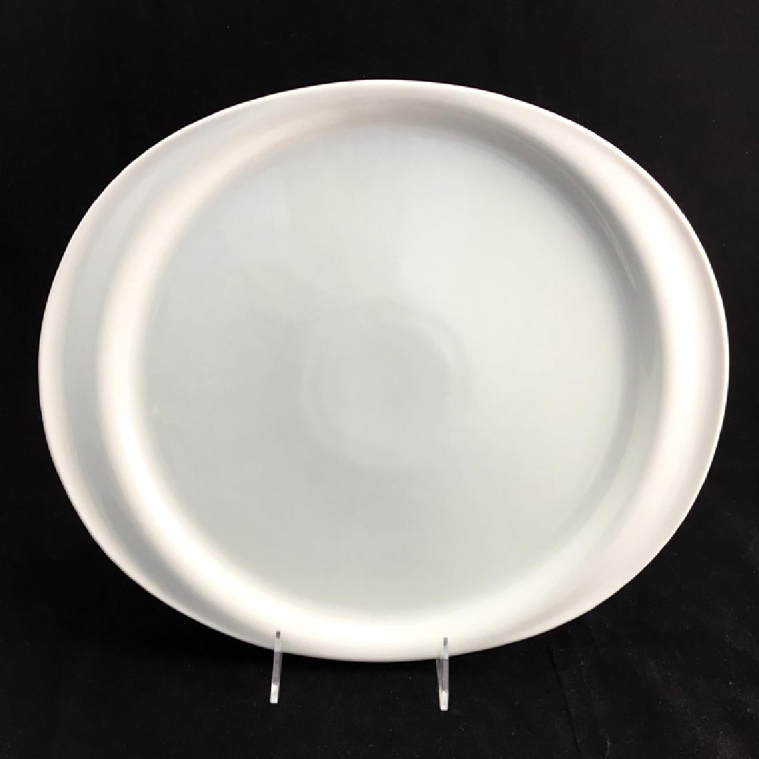 Zeisel Nambe Eden Platter and Bowl (2008): Eva Zeisel, Oval Serving Platter from the Eden Line, Nambé, design 4432, with Bowl, design 4433, designed 2008, no longer in production. High-fired porcelain. Manufactured in Thailand. Platter: 15 x