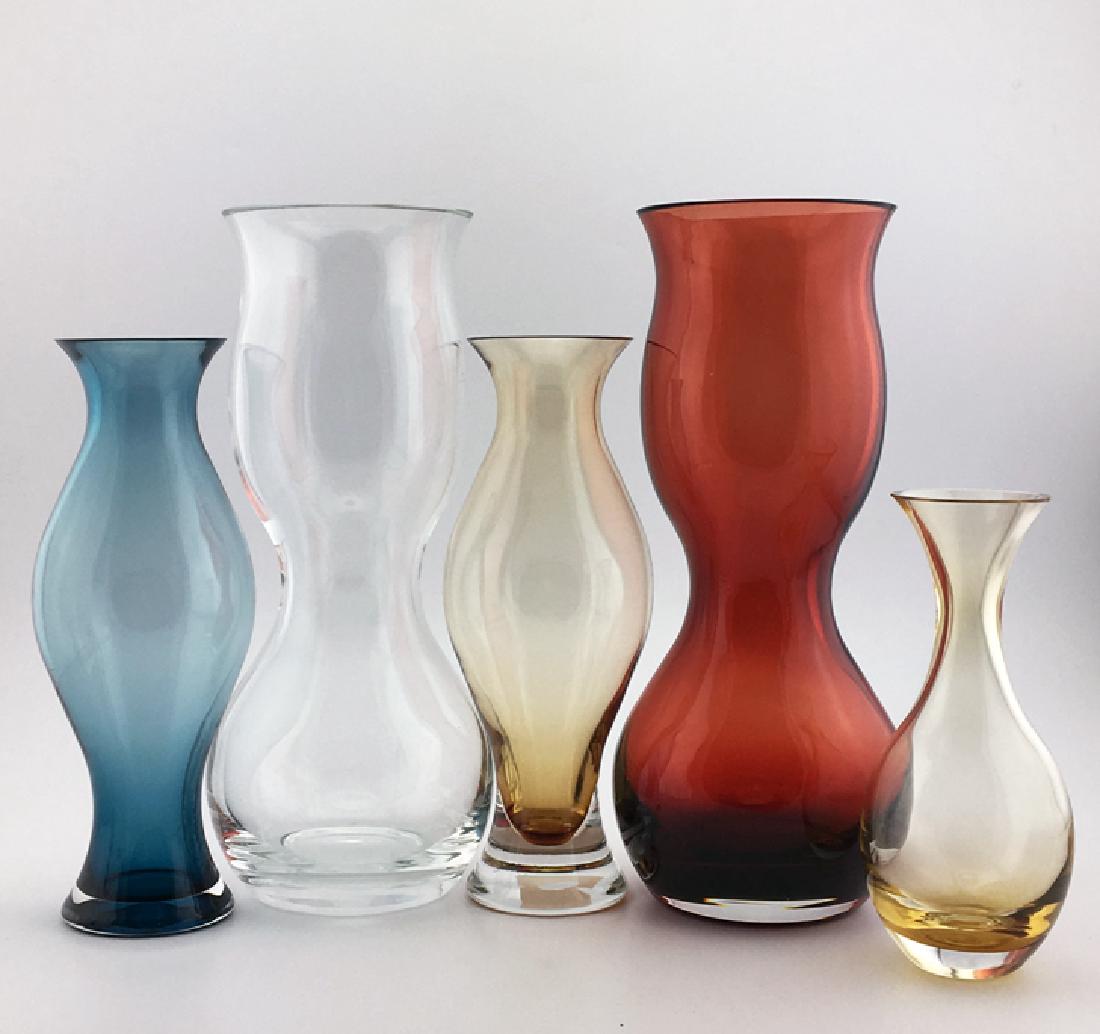 Zeisel KleinReid Upright Glass Vases Set: Eva Zeisel with KleinReid (James Klein and David Reid), five Upright Vases in mouth blown colorless, red, blue, and amber glass, designed 1999, produced 2004. The underside of the four largest engrave