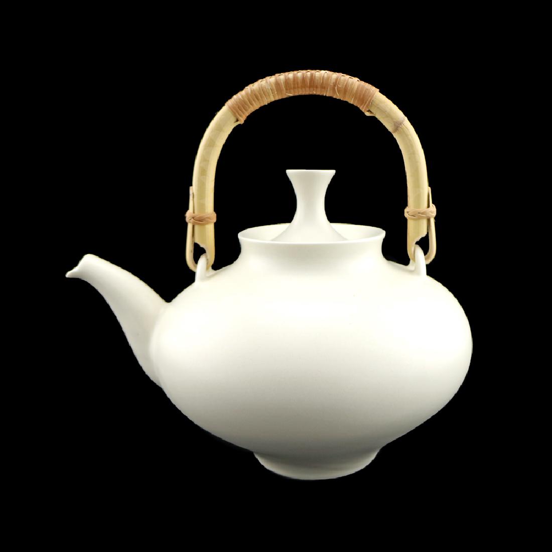 Zeisel KleinReid Tea/Coffee Set: Eva Zeisel with KleinReid (James Klein and David Reid), Teapot, Covered Sugar, and Creamer, KleinReid, 2002. Porcelain with satin glaze, the teapot with bamboo handle. The underside impressed with a f