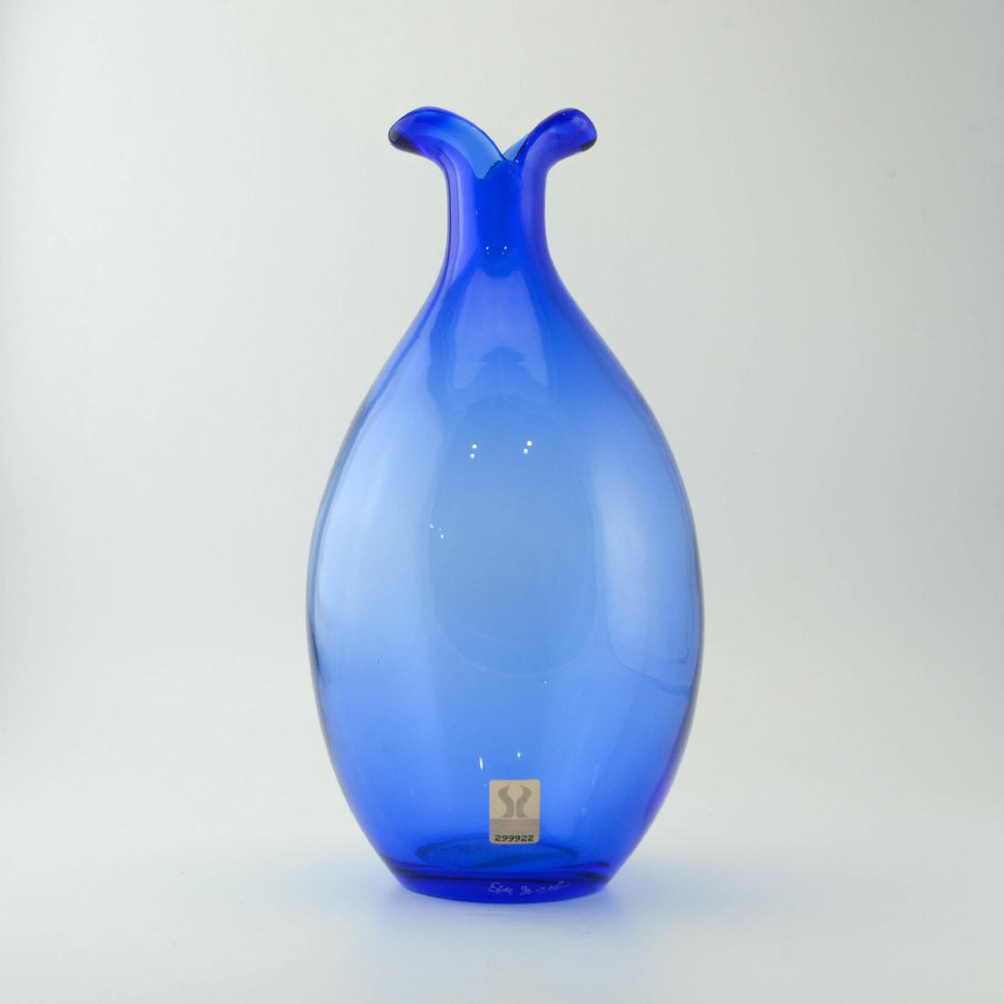 Zeisel Mglass Blue Vase (2004): Eva Zeisel, a hand blown sapphire blue glass vase, V Collection (?), MGlass, Marinha Grande, Portugal, 2004. The underside lightly etched or engraved mglass and with attached Mglass paper tag with bar