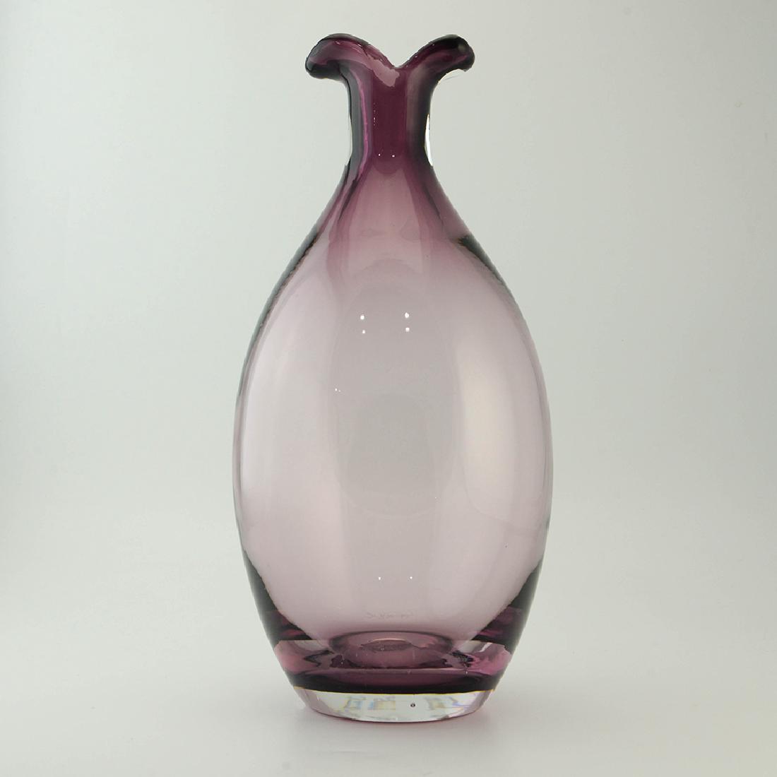 Zeisel Mglass Cased Amethyst Glass Vase: Eva Zeisel, a hand blown cased amethyst and colorless glass vase, V Collection (?), MGlass, Marinha Grande, Portugal, 2004. The underside lightly etched or engraved mglass and, at the base, an engrave