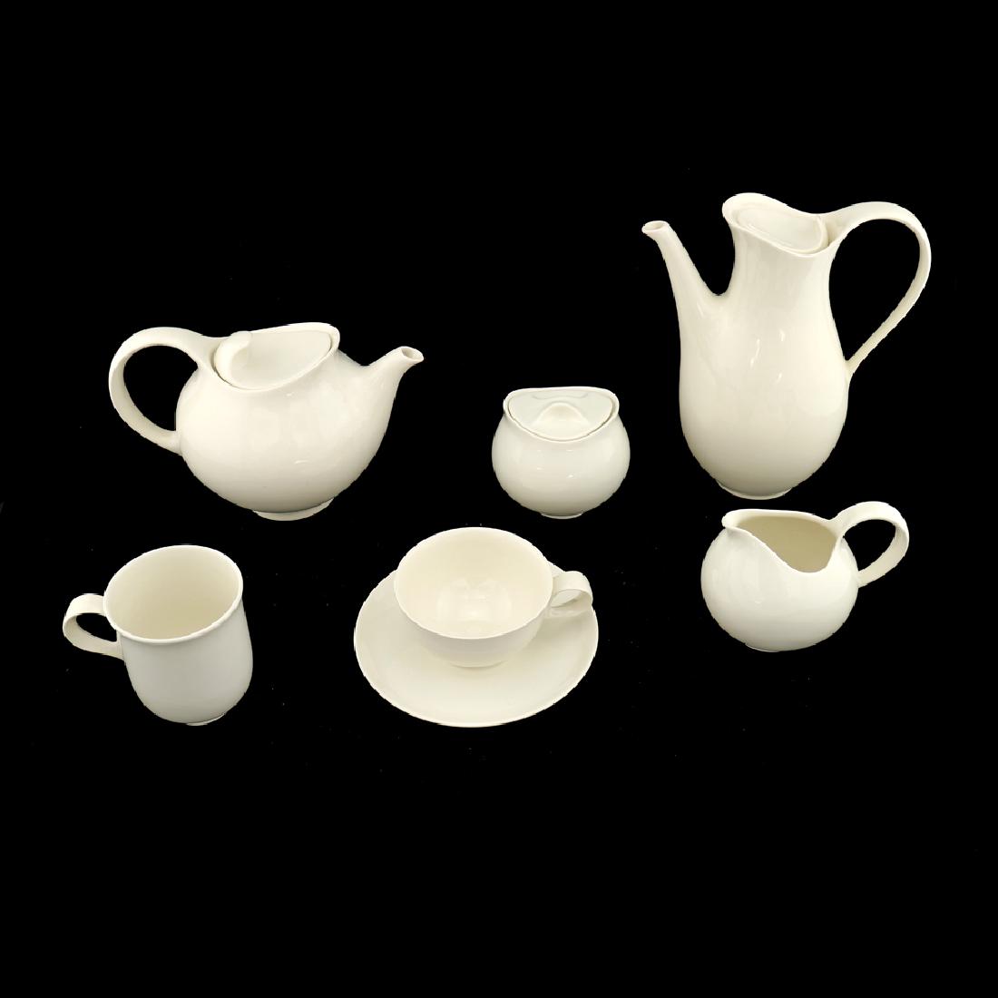 Zeisel Classic Century Coffee/Tea Set: Eva Zeisel, a part Tea and Coffee Service comprising a covered Coffee Pot, a covered Teapot, a lidded Sugar Bowl, a Creamer, a Coffee Mug, and a Cup and Saucer, Classic Century, Royal Stafford, Stoke-