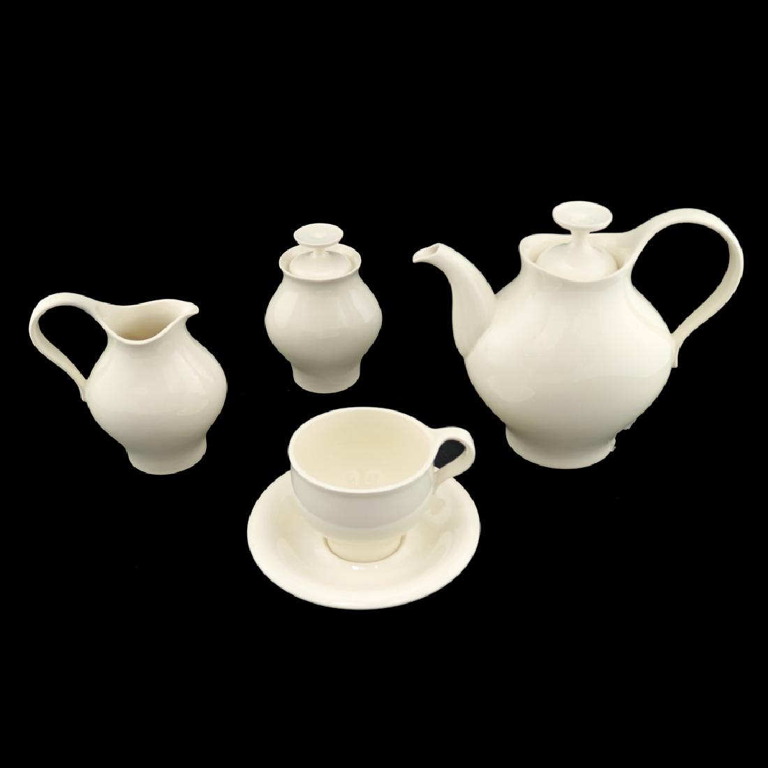 Zeisel One-O-One Line Coffee/Tea Set (2006): Eva Zeisel, a group of pieces for serving coffee or tea comprising a Tea or Coffee Pot with lid, a Creamer, a Sugar with lid, and a Cup and Saucer, One-O-One, Royal Stafford, Stoke-on-Trent, England,
