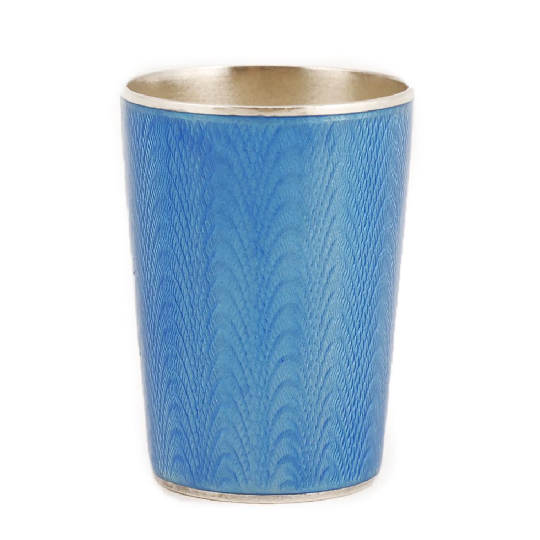 Russian silver enamel beaker shot glass: A Russian silver gilt and guilloche enamel beaker, Grachev Brothers, St. Petersburg, 1899-1903. Of tapering form enameled translucent cerulean blue over a wavy engine turned ground, gilt interior. Str